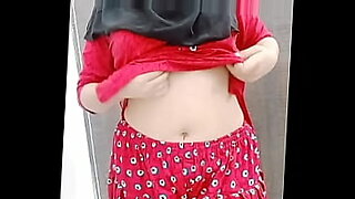 petite-brunette-red-latex-shopping-trying-clothes-porn